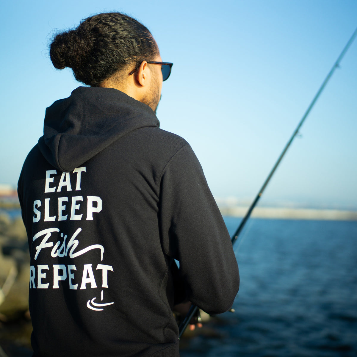 「EAT SLEEP FISH REPEAT®︎」バックプリントパーカー